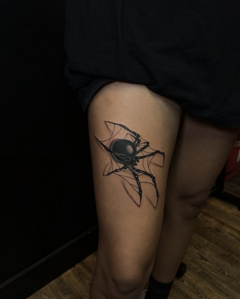 Bold Black Widow Spider Thigh Tattoo Tattoo Design