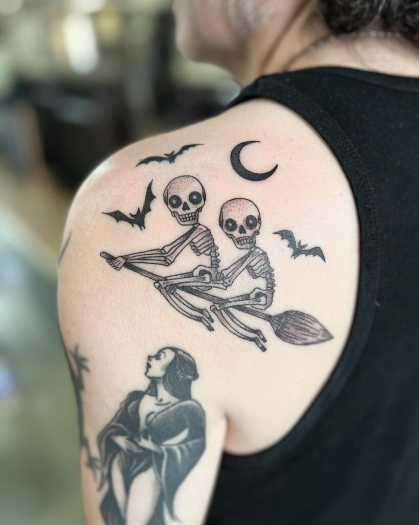 Skeleton Couple Riding a Broomstick Tattoo Tattoo Design