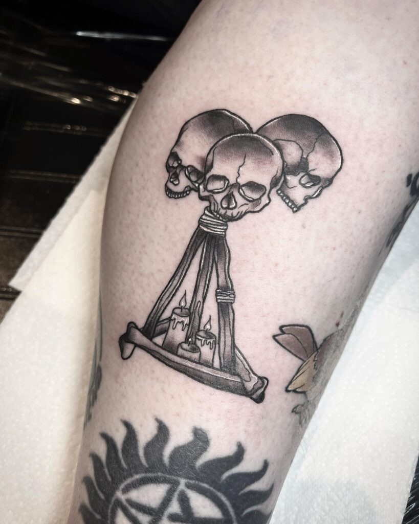 Skull Chandelier Tattoo with Dripping Candles Tattoo Design