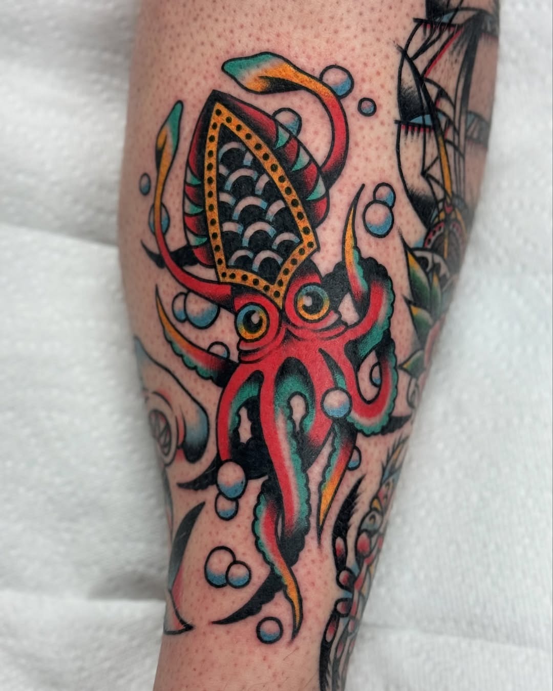 Bold and colorful squid tattoo design Tattoo Design