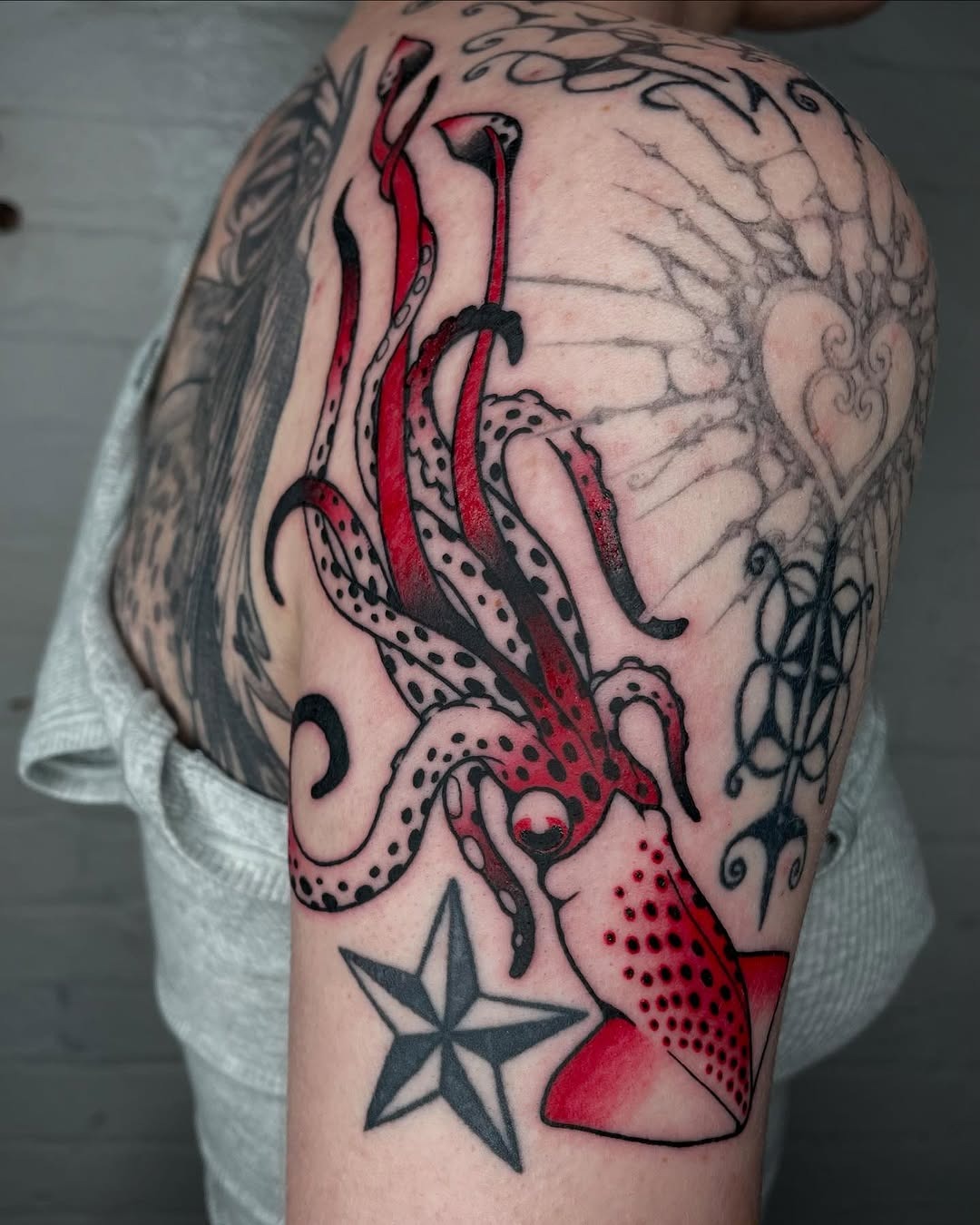 Bold squid tattoo with intricate detailing Tattoo Design