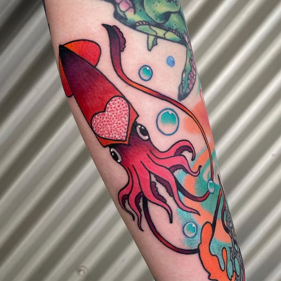 Colorful squid tattoo with heart details Tattoo Design