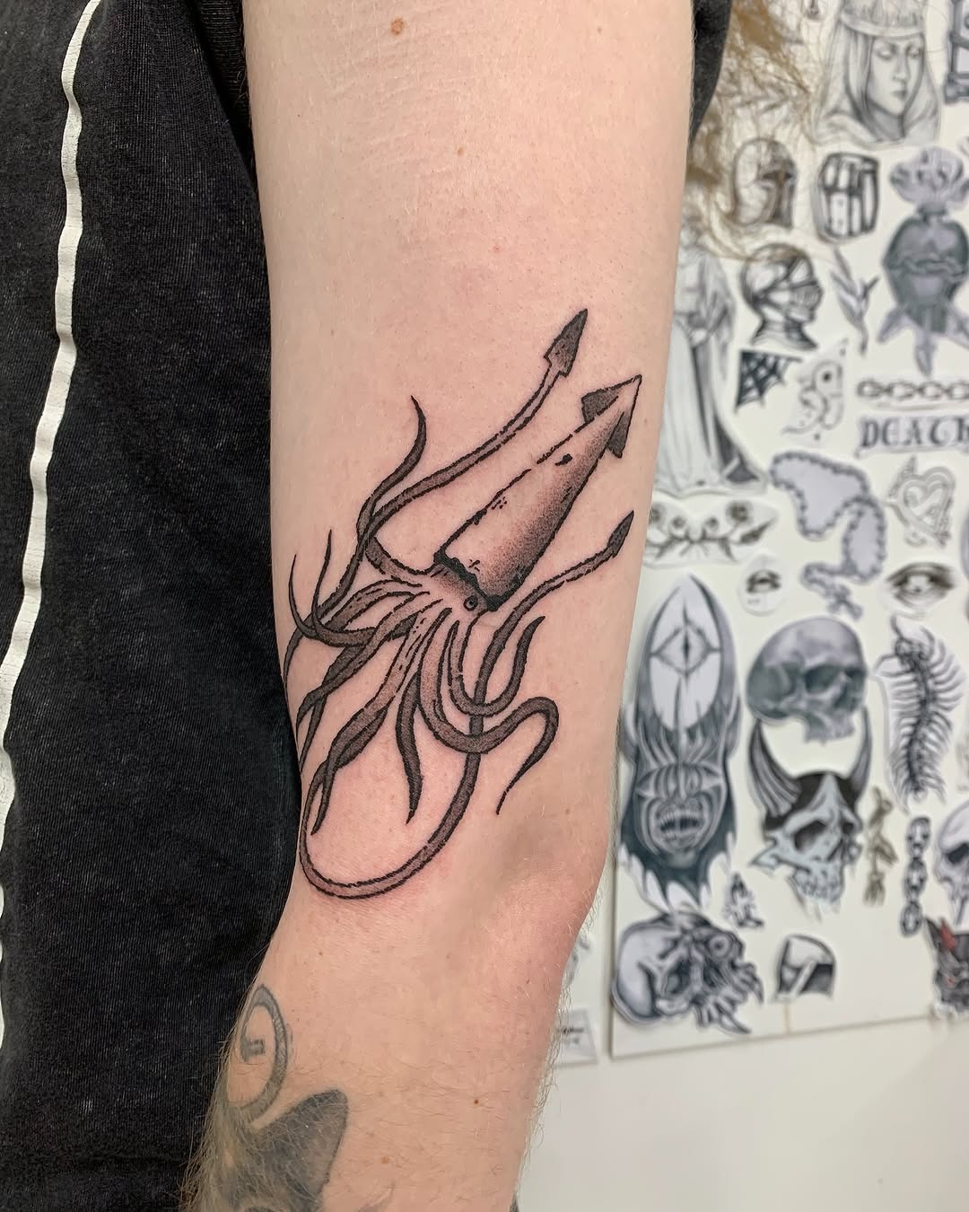 Intricate squid tattoo showcasing artistic flair Tattoo Design