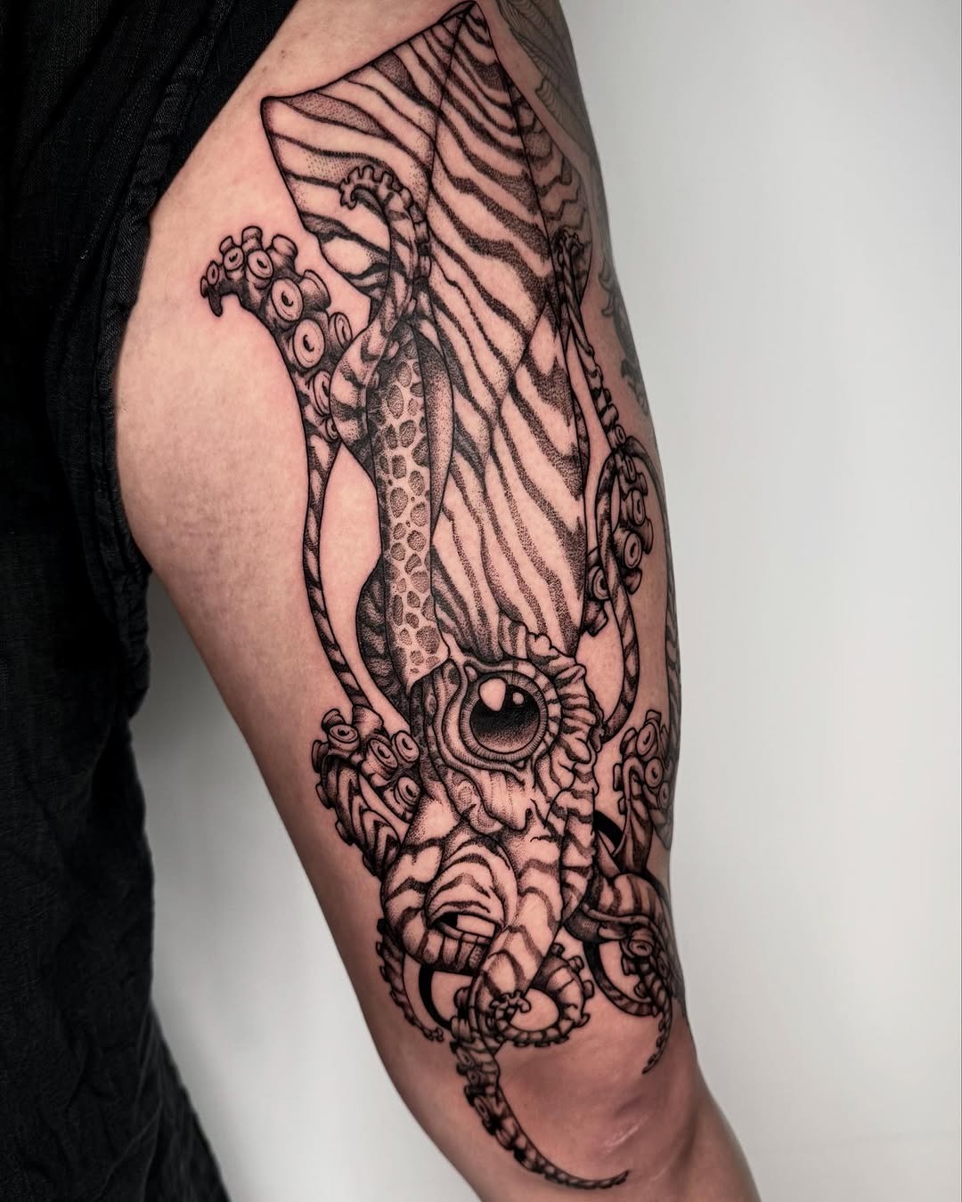 Intricate squid tattoo with bold black lines Tattoo Design