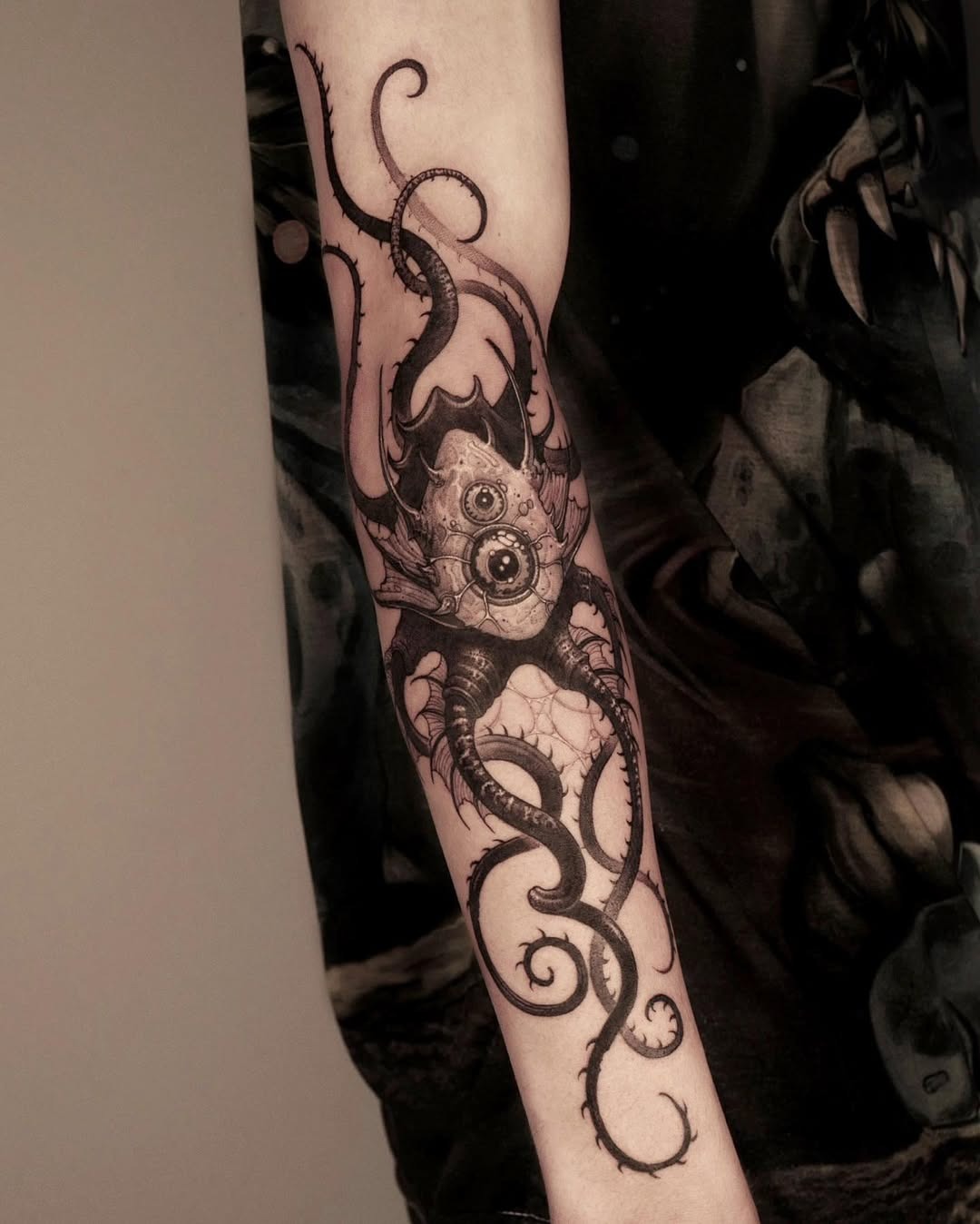 Intricate Squid Tattoo with Unique Elements Tattoo Design