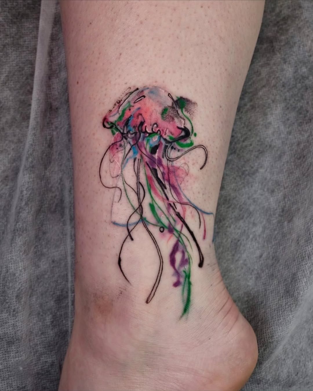 Mesmerizing jellyfish tattoo with vibrant colors Tattoo Design
