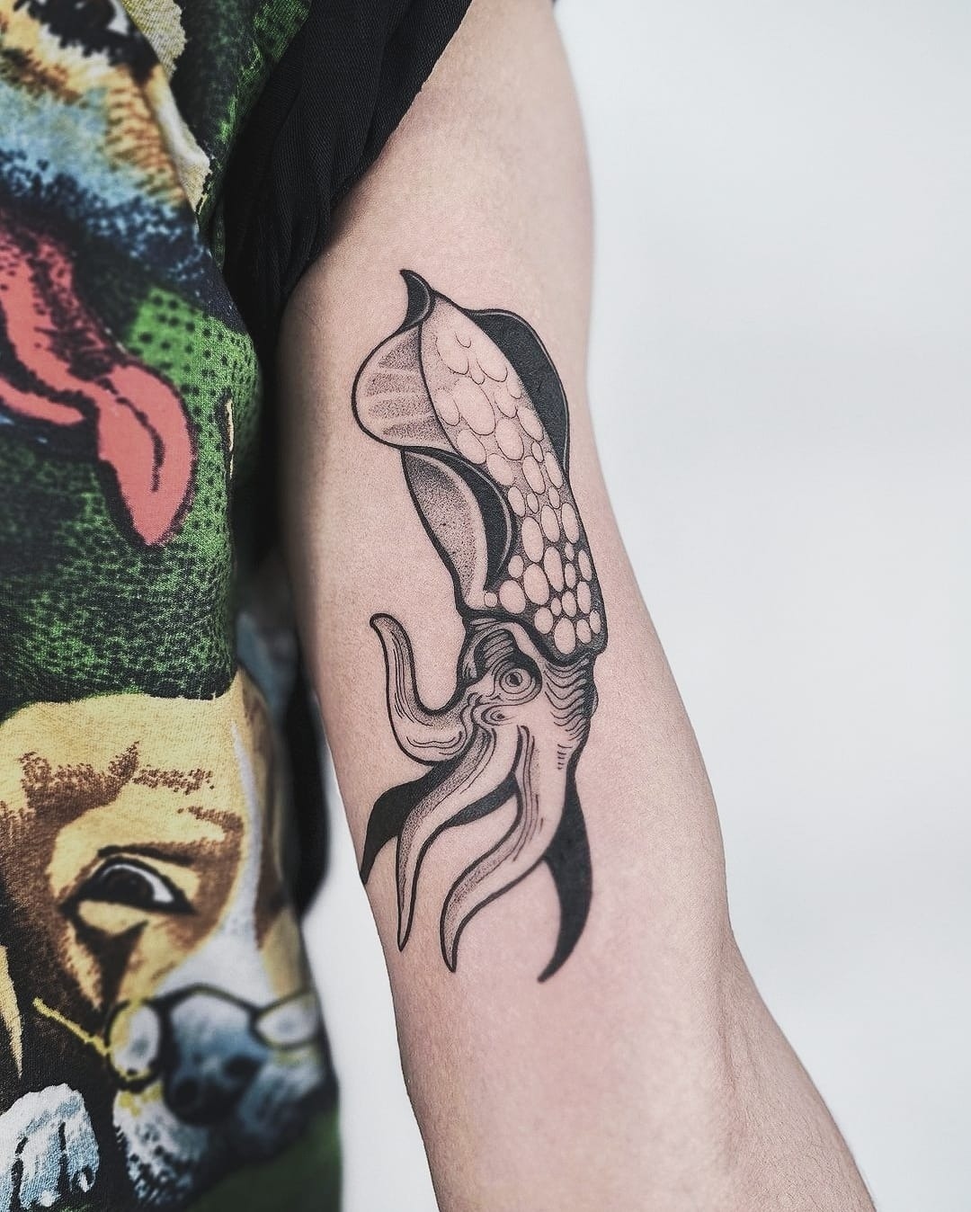 Stylish squid tattoo on the forearm Tattoo Design
