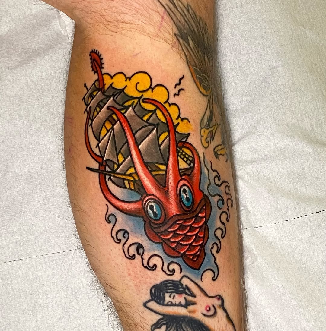 Unique squid tattoo with bold colors Tattoo Design
