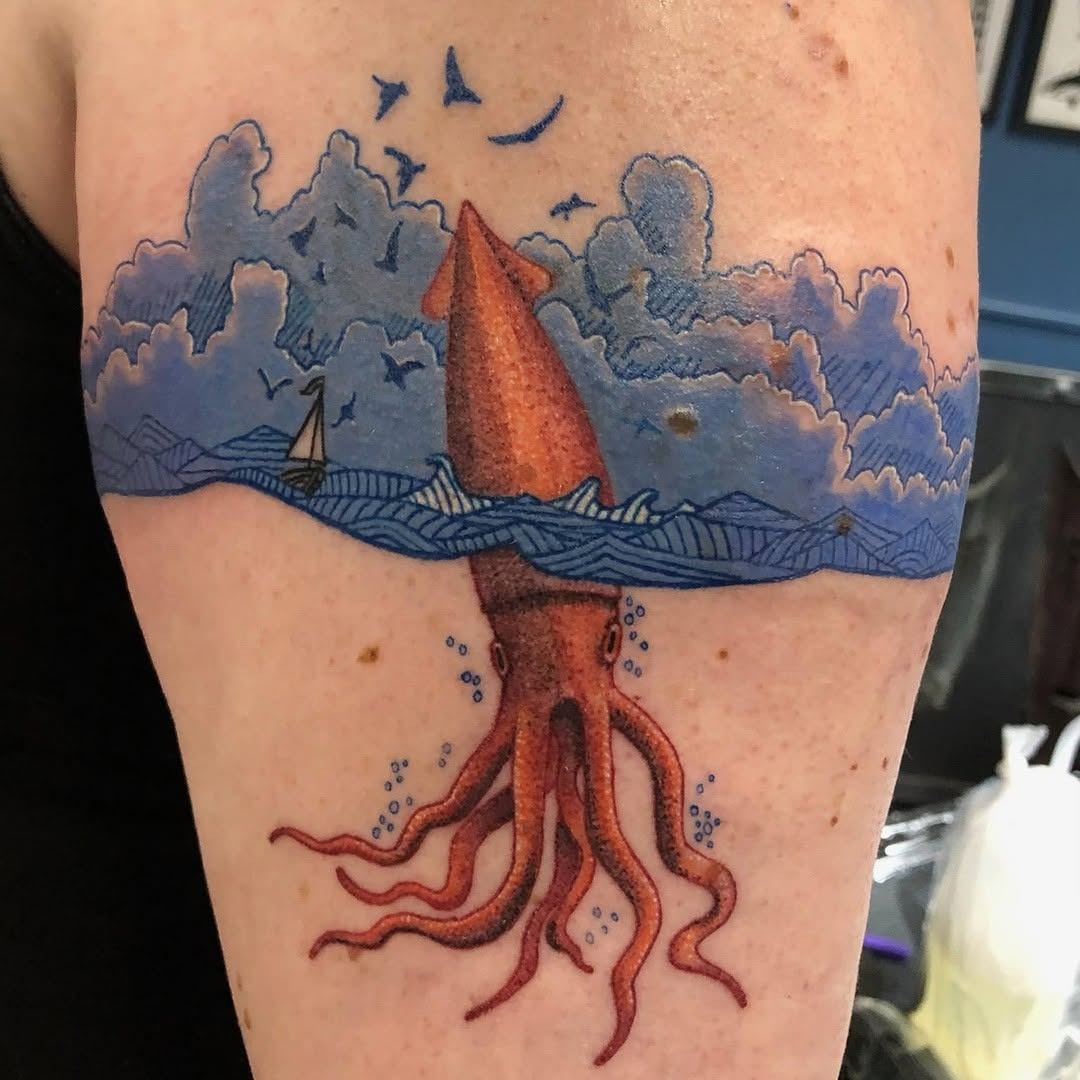Vibrant squid tattoo amidst ocean waves Tattoo Design