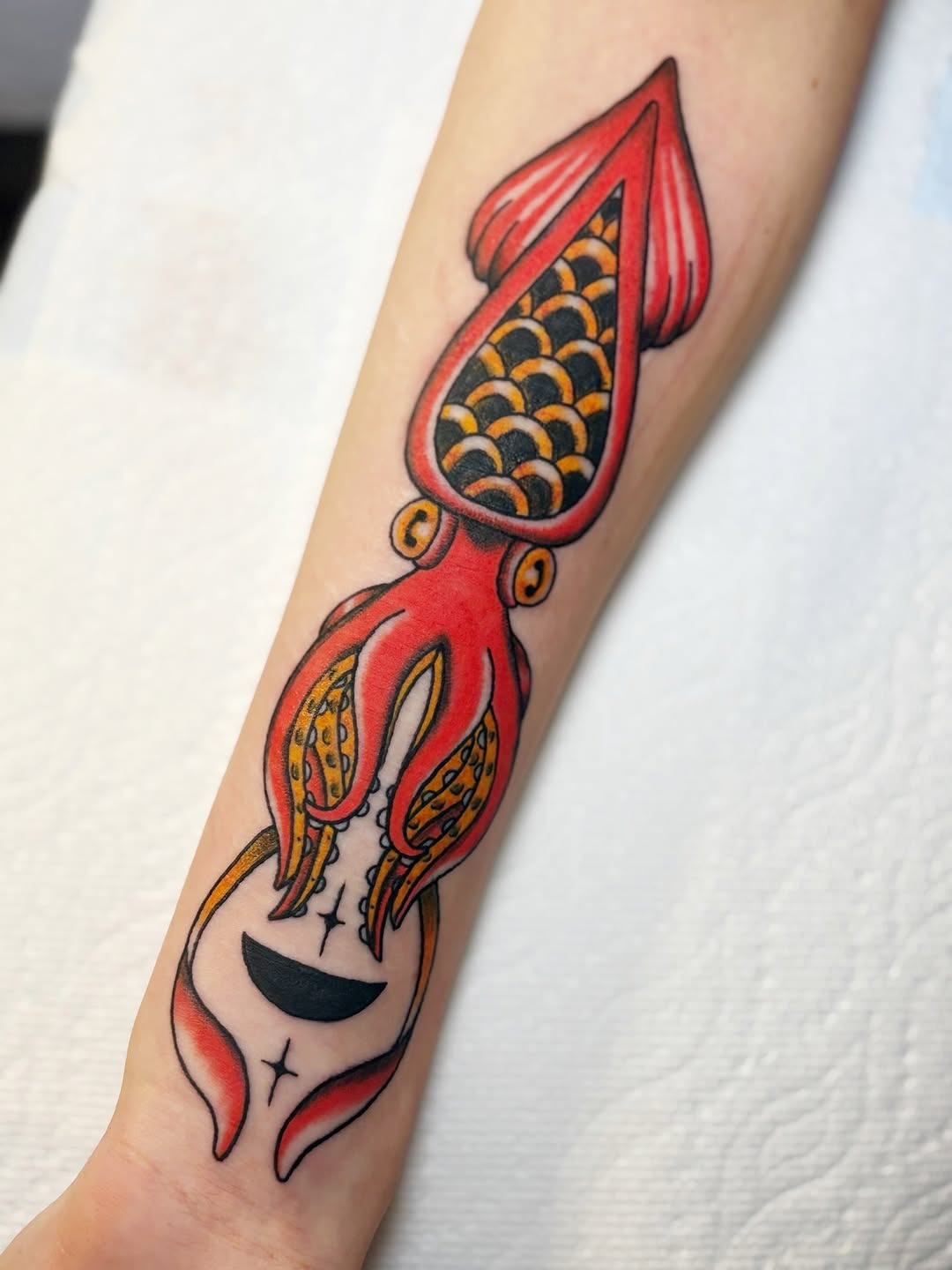 Vibrant squid tattoo showcasing bold colors Tattoo Design