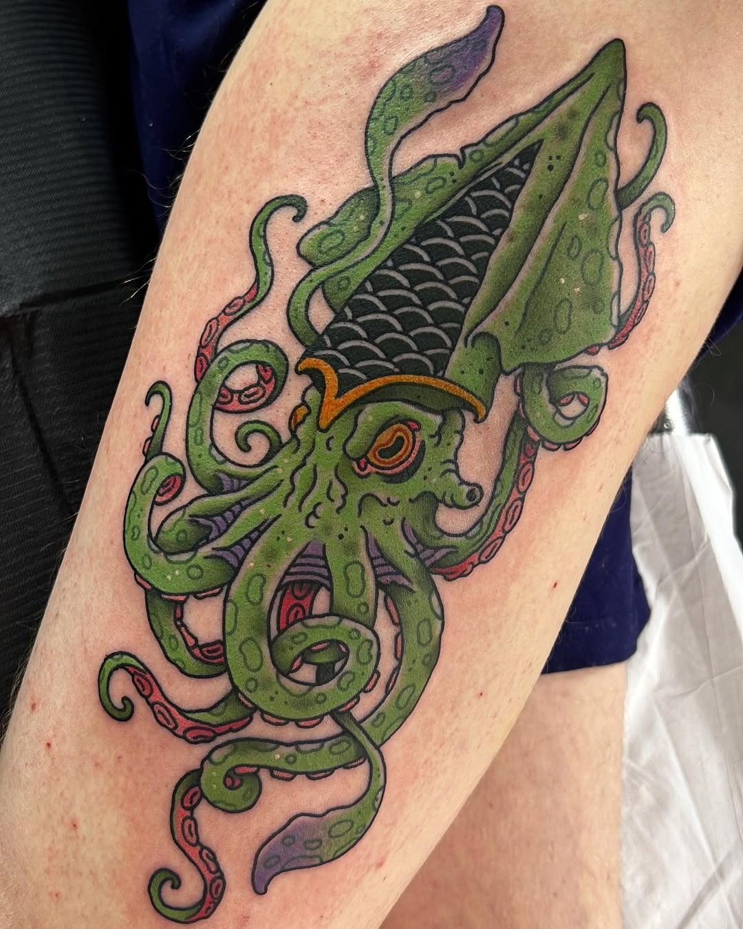 Vibrant squid tattoo with striking details Tattoo Design