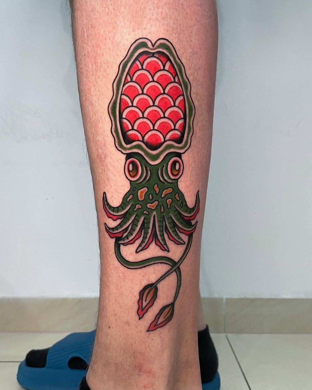 Vibrant squid tattoo with unique design elements Tattoo Design