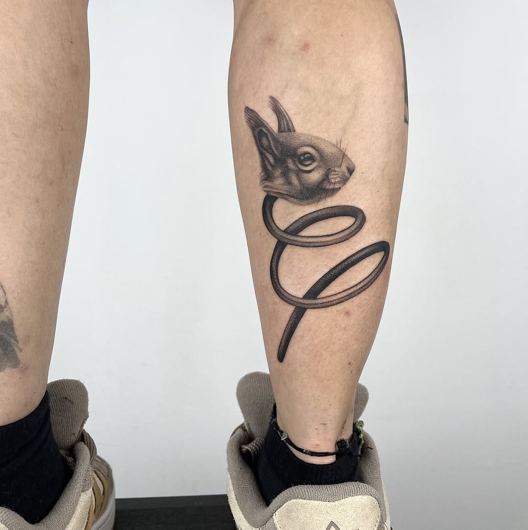 Artful Squirrel Tattoo with Fluid Lines Tattoo Design