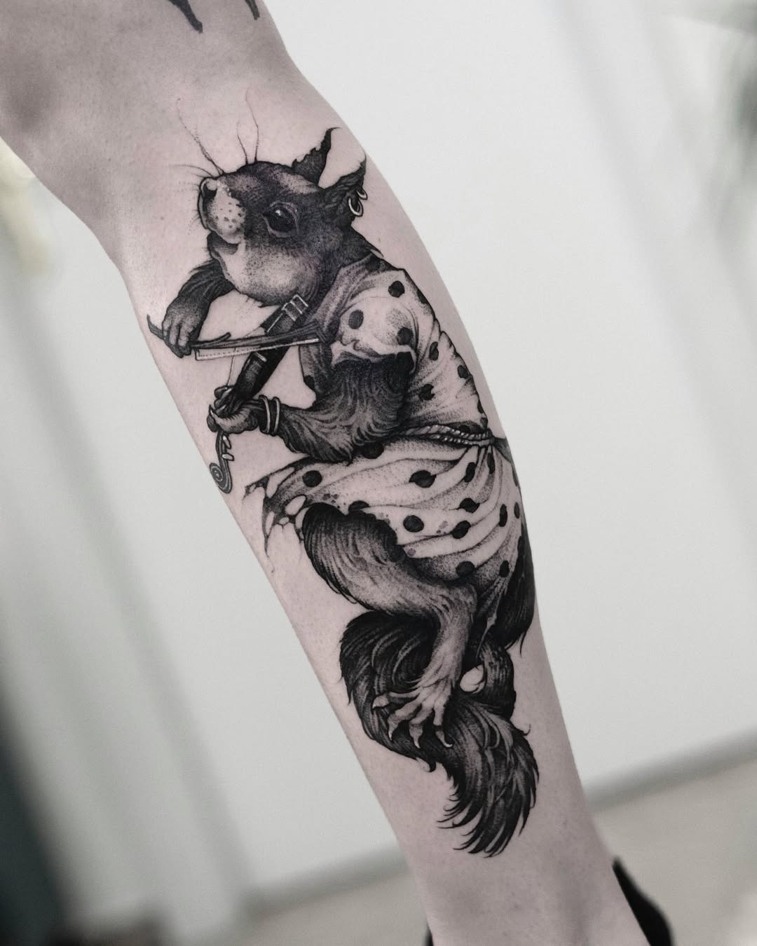 Charming squirrel in whimsical dancing attire Tattoo Design