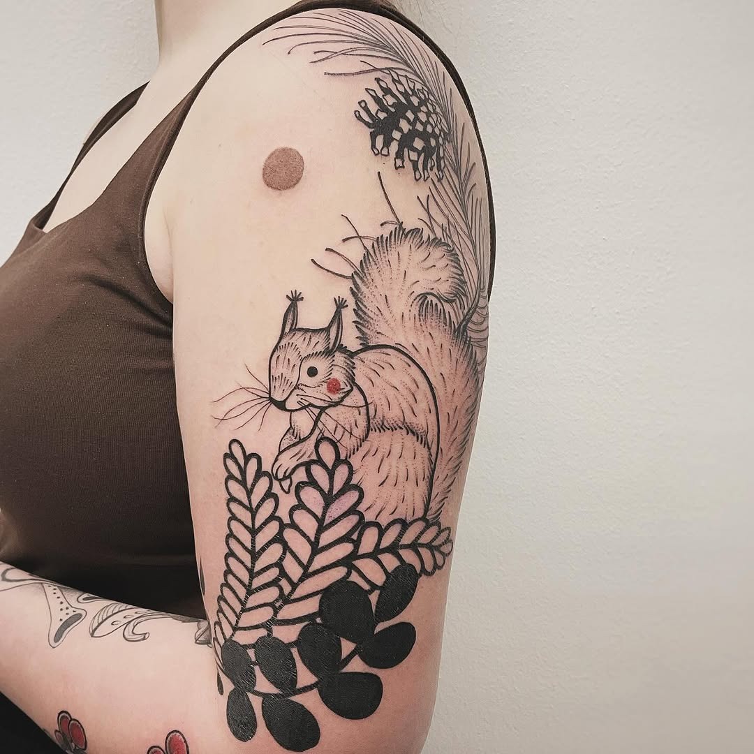 Charming squirrel tattoo amidst lush foliage Tattoo Design