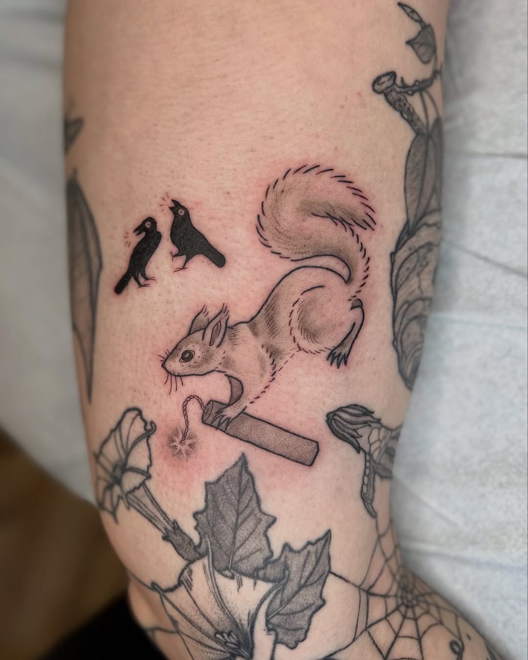 Charming squirrel tattoo with whimsical elements Tattoo Design