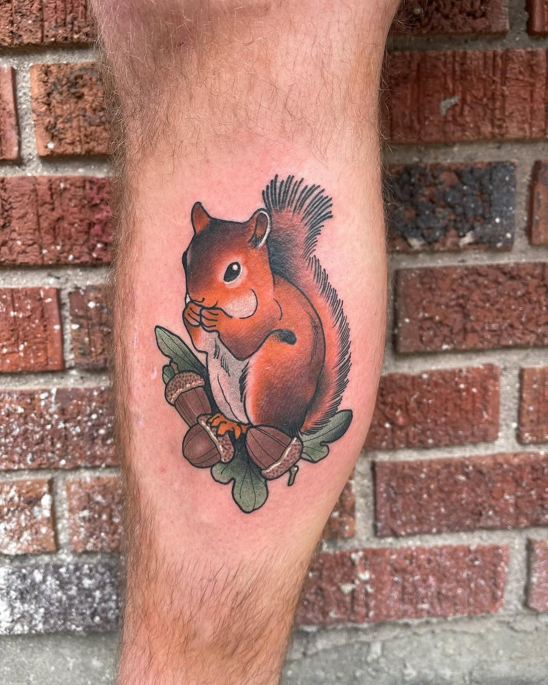 Detailed squirrel tattoo with acorns and leaves Tattoo Design