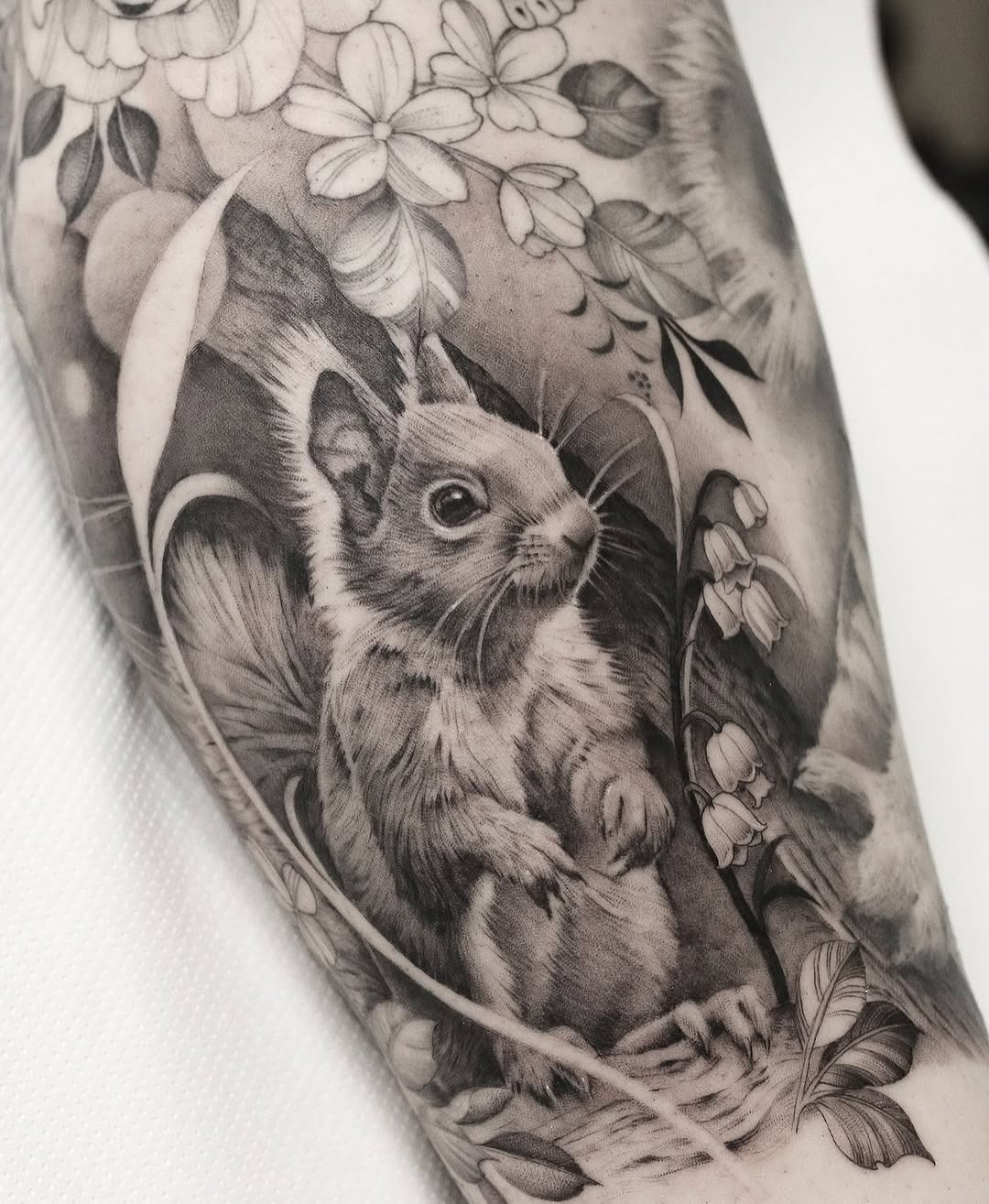 Intricate black-and-grey squirrel tattoo design Tattoo Design