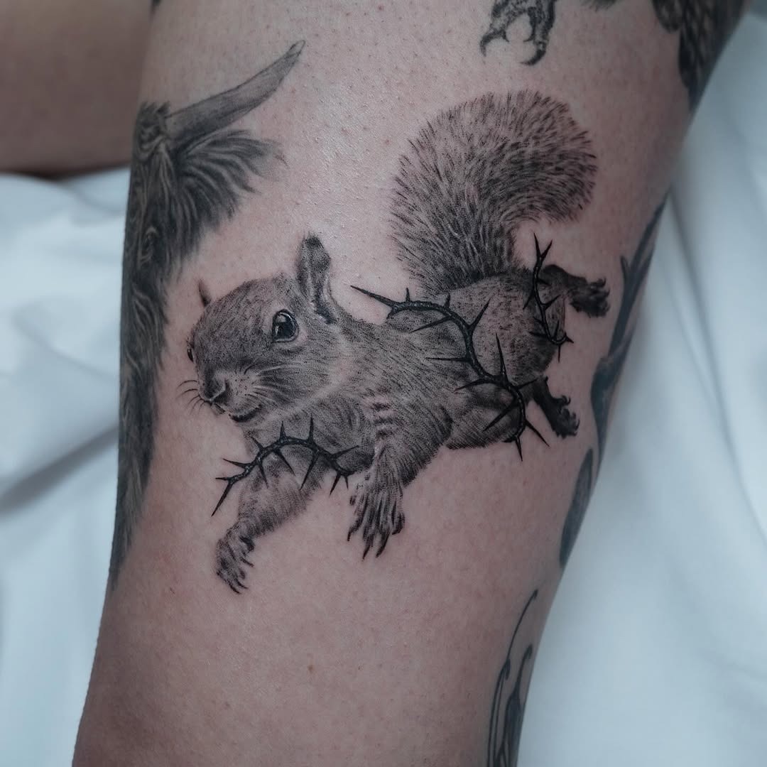 Squirrel Tattoo Breaking Through Thorns Tattoo Design