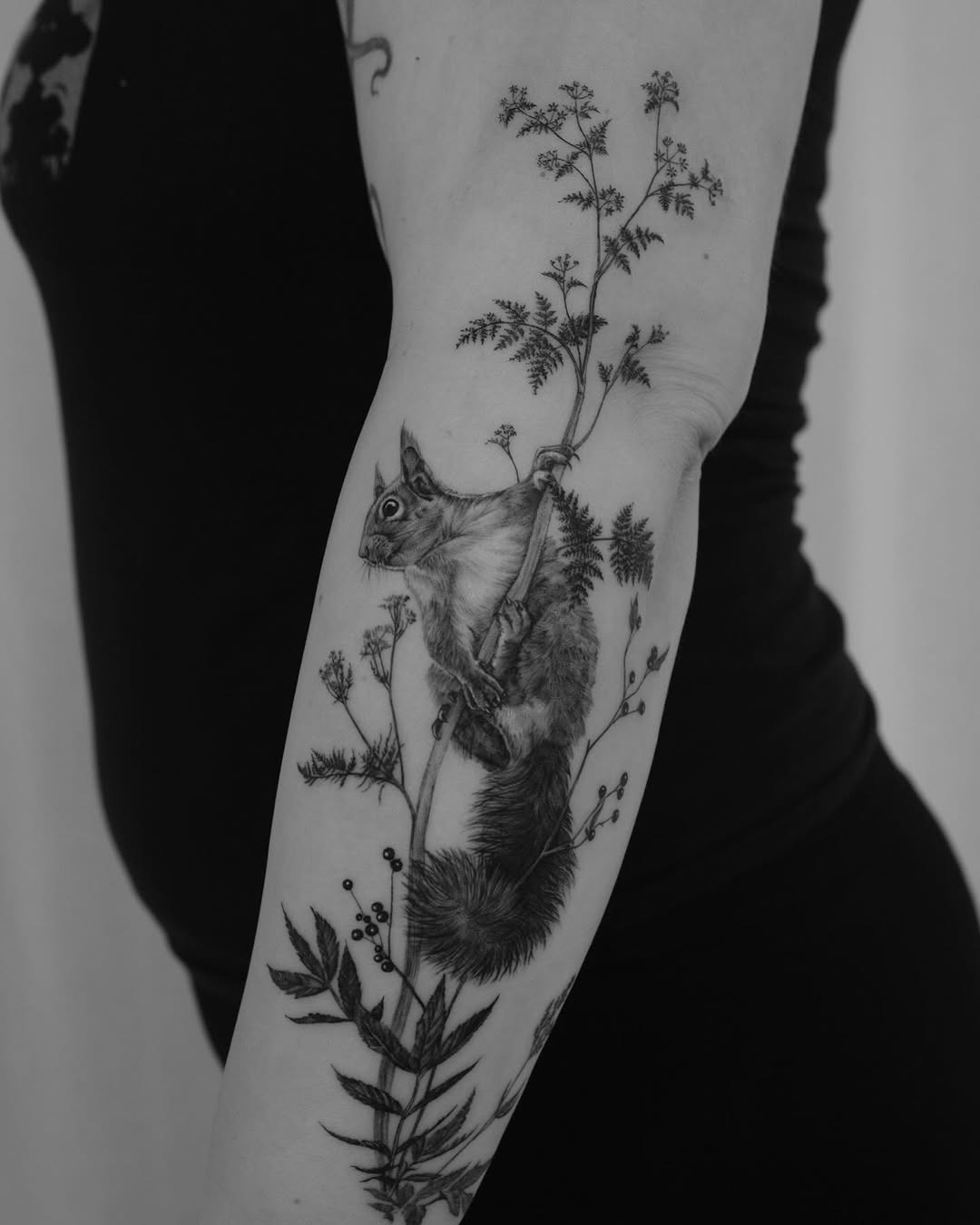 Stunning blackwork squirrel surrounded by foliage Tattoo Design