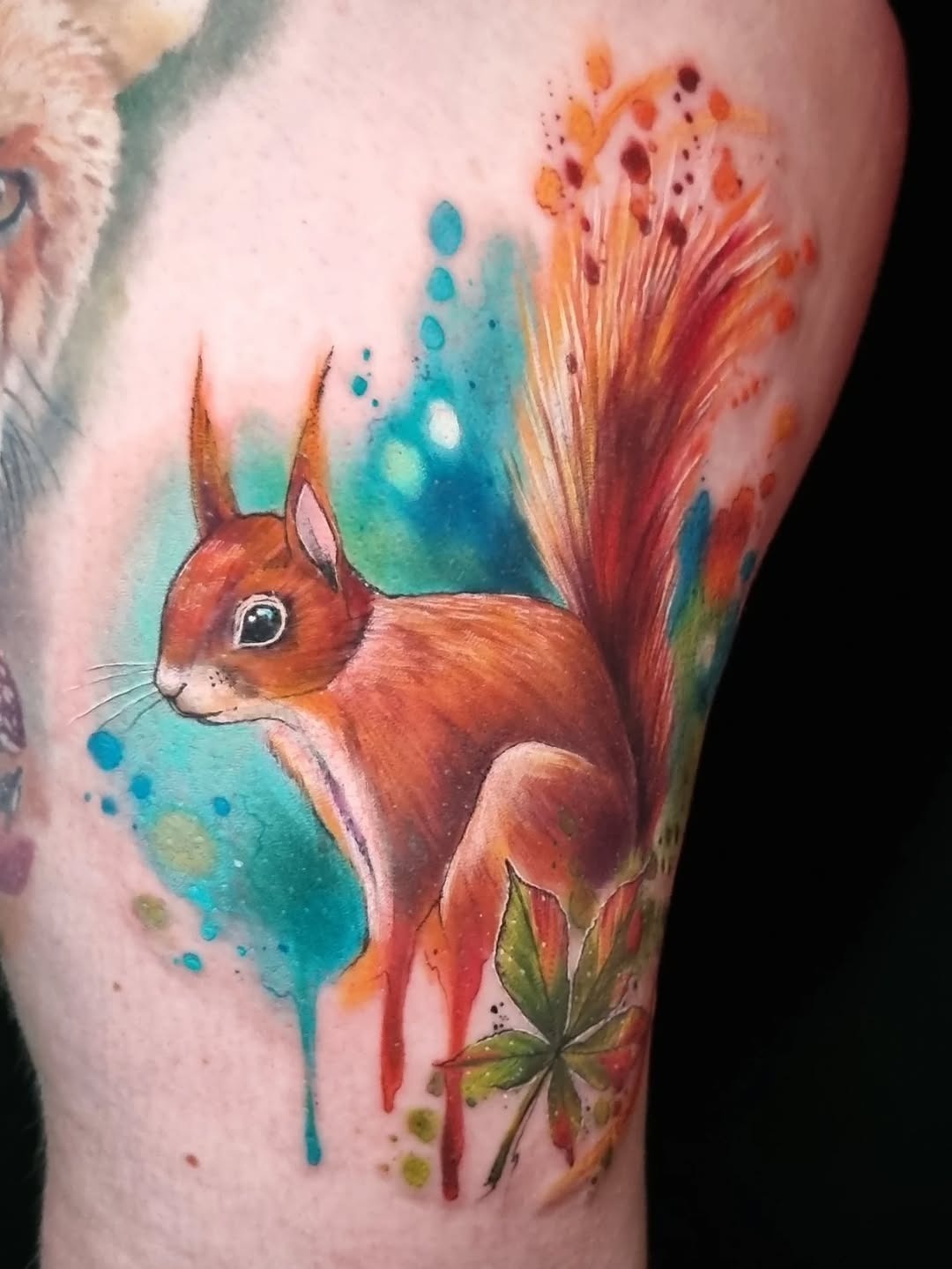 Vibrant Squirrel Tattoo with Nature Accents Tattoo Design