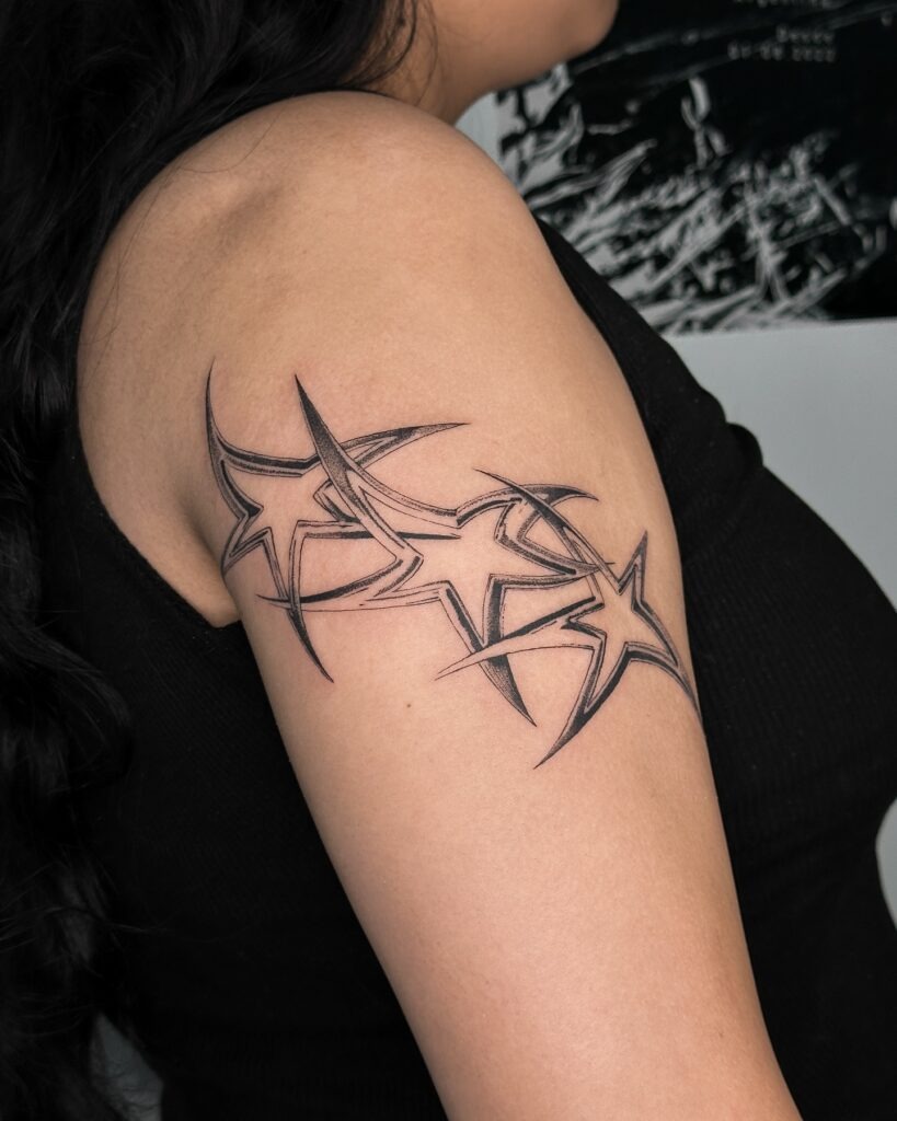 Abstract Starburst Arm Tattoo Tattoo Design
