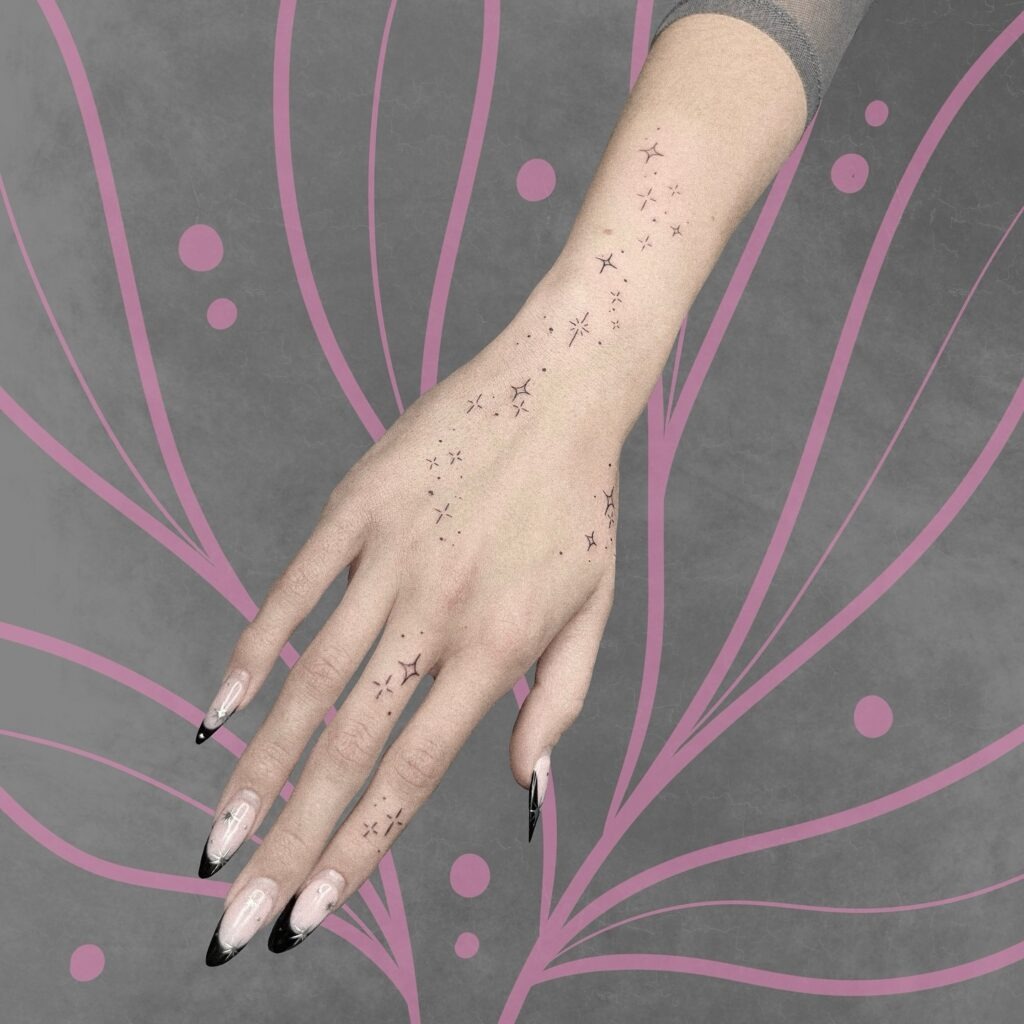 Cosmic Sparkle Hand and Arm Tattoo Tattoo Design