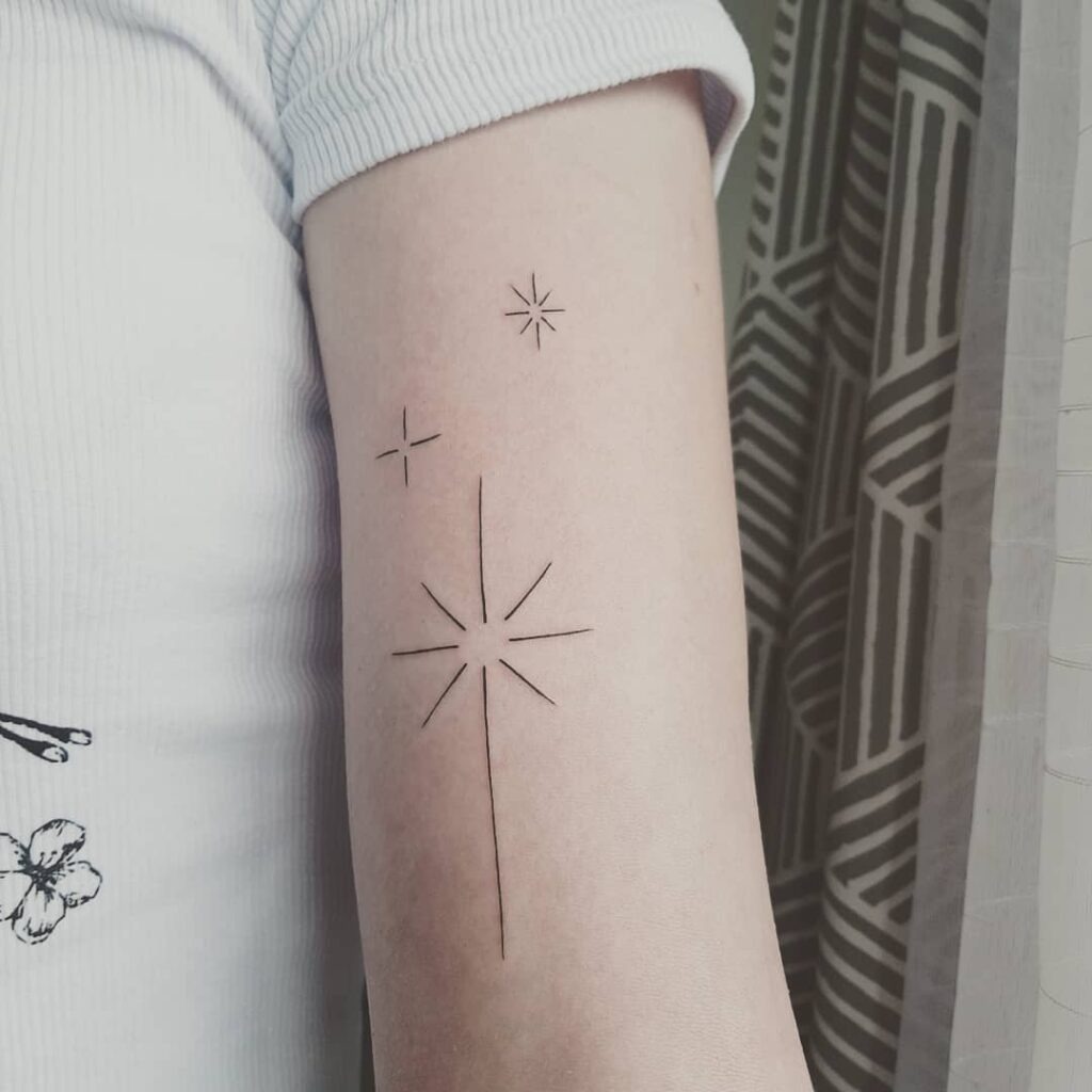 Minimalist Starburst Arm Tattoo Tattoo Design