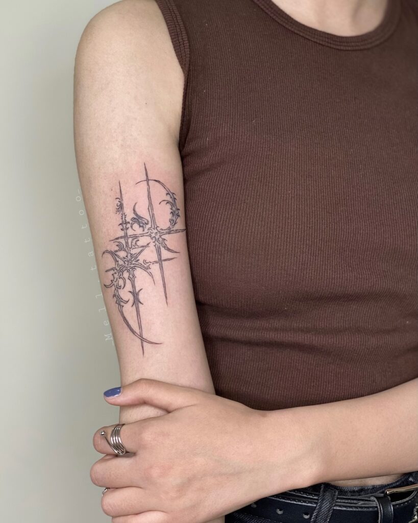 Ornamental Starburst Arm Tattoo Tattoo Design