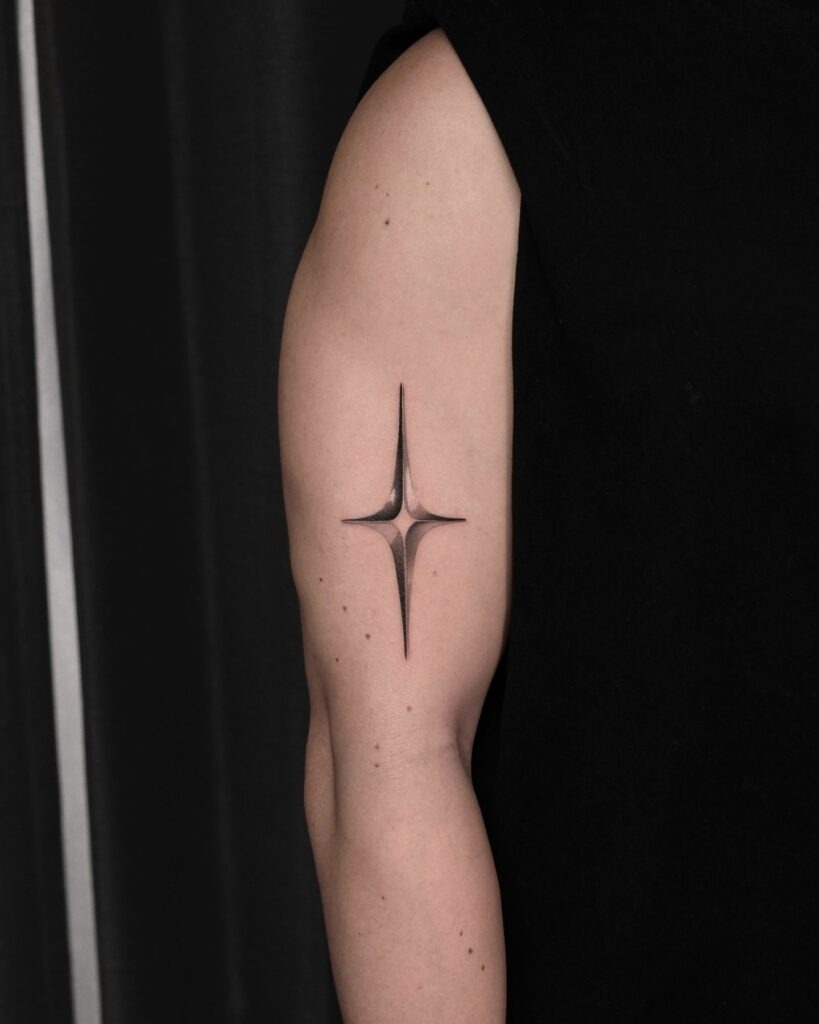 Sleek Gradient Starburst Arm Tattoo Tattoo Design
