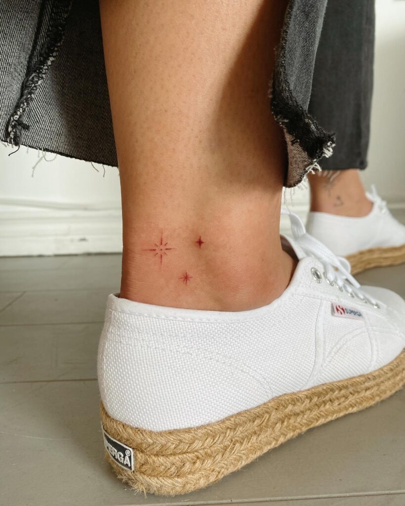 Tiny Red Star Trio Ankle Tattoo Tattoo Design