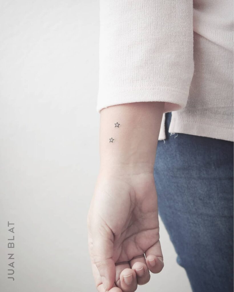 Two Tiny Outline Stars Wrist Tattoo Tattoo Design