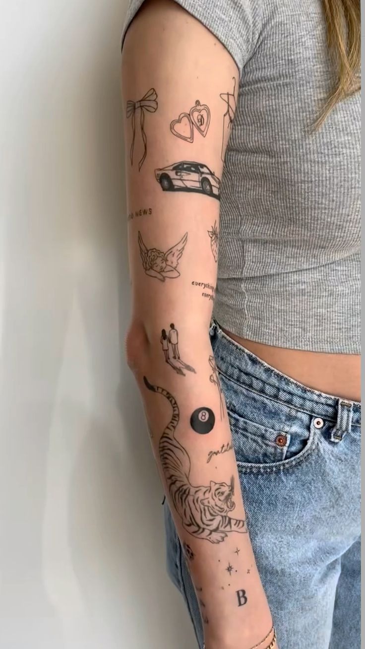 Tiny Symbol Sticker Sleeve for an Easy Everyday Look Tattoo Design