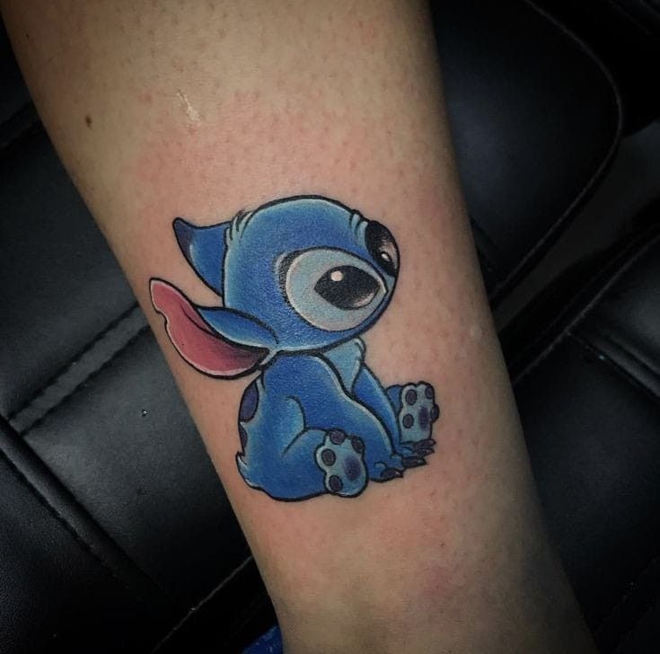 Blue Baby Stitch Color Tattoo, a tattoo design rendered in clean detailed linework.