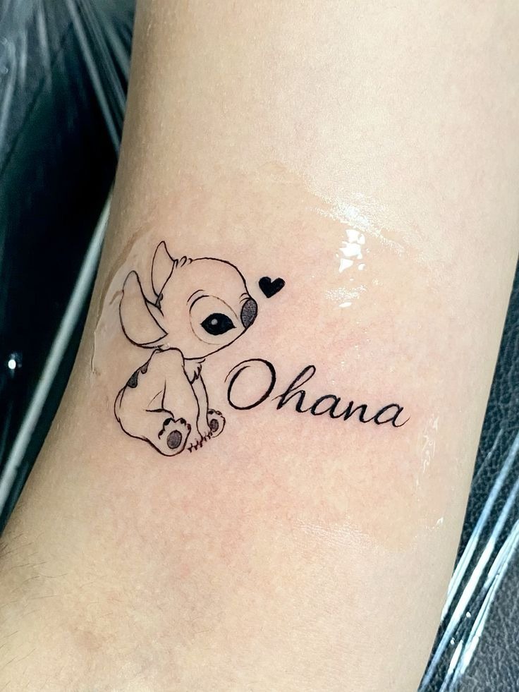 Fine Line Stitch Ohana Tattoo, a tattoo design rendered in fine-line for the hand.
