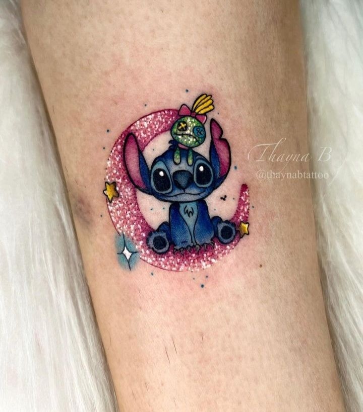 Glitter Moon Stitch and Scrump Tattoo, a tattoo design rendered in clean detailed linework.
