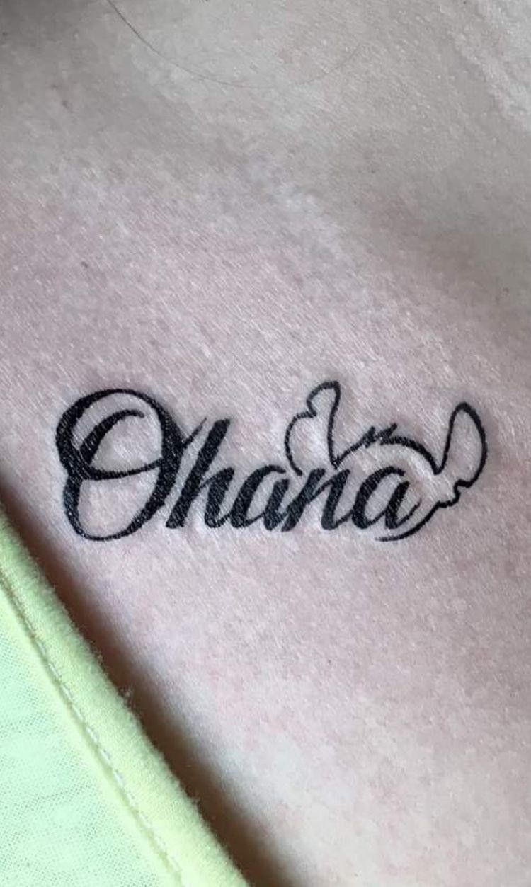 Ohana Script with Stitch Ears Tattoo, a tattoo design rendered in bold traditional for the leg.