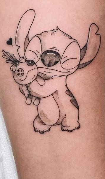 Stitch Hugging Scrump Black-and-White Tattoo, a tattoo design rendered in clean detailed linework.