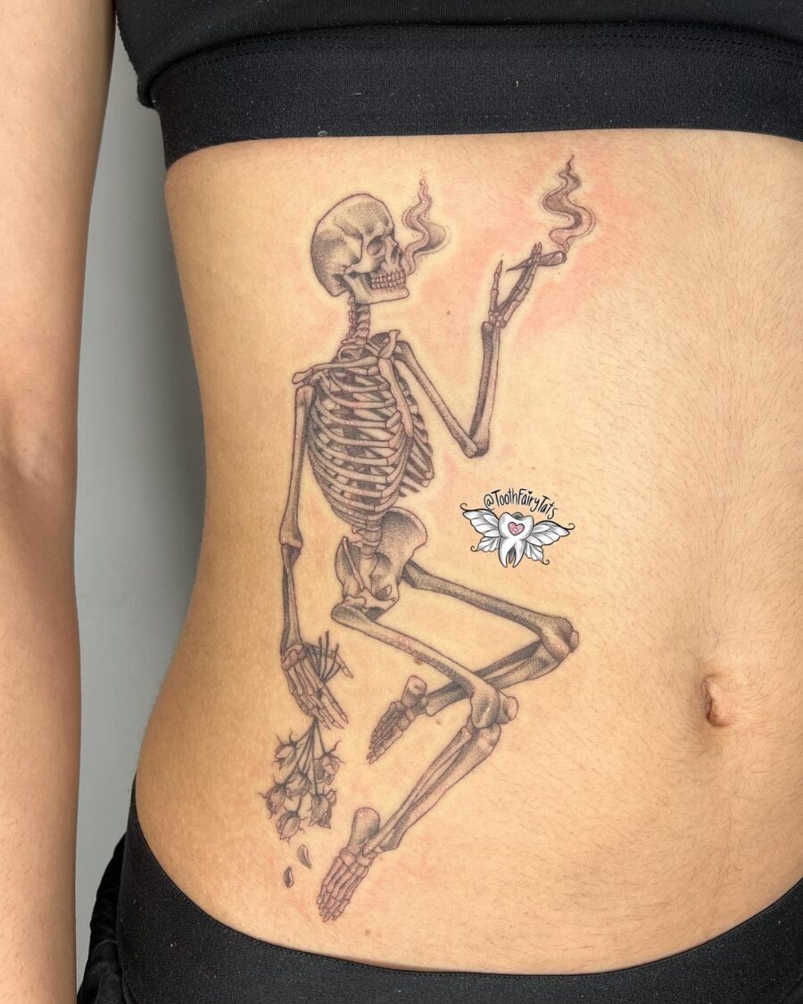 Artistic skeleton tattoo with smoke effects Tattoo Design