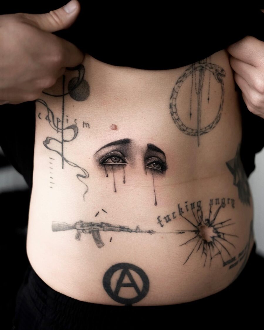 Artistic stomach tattoo reflecting deep emotions Tattoo Design