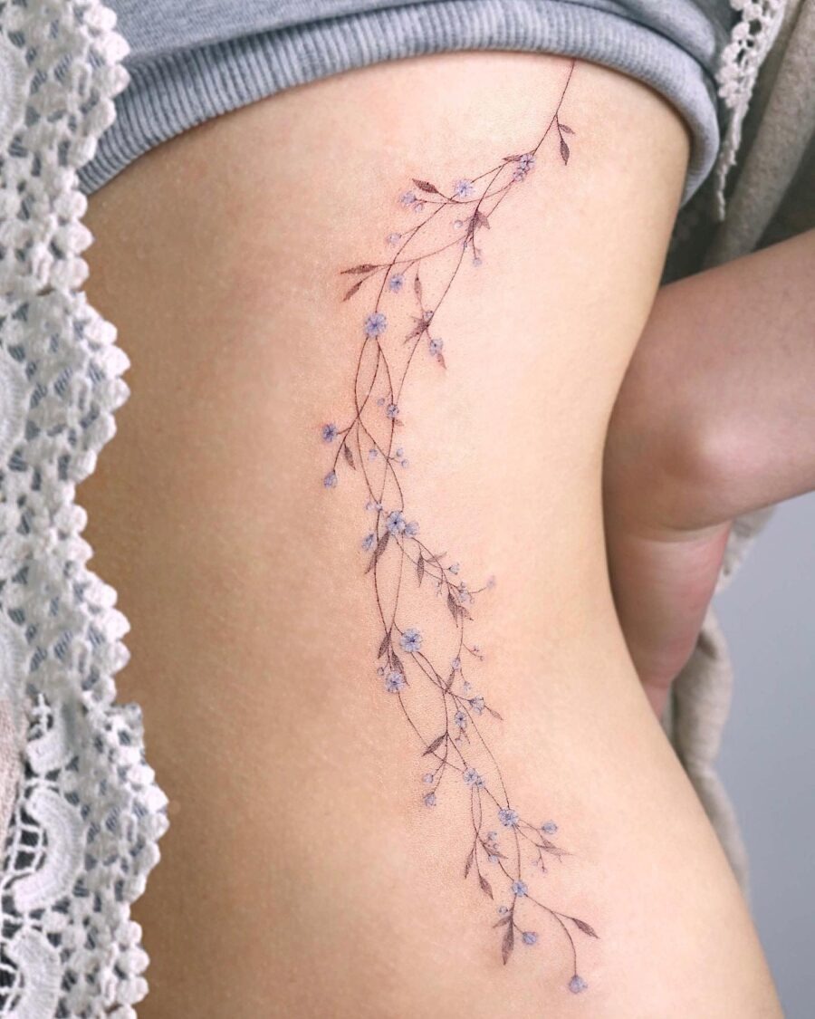 Delicate floral design on the stomach Tattoo Design