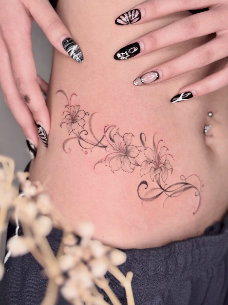 Delicate floral stomach tattoo design Tattoo Design