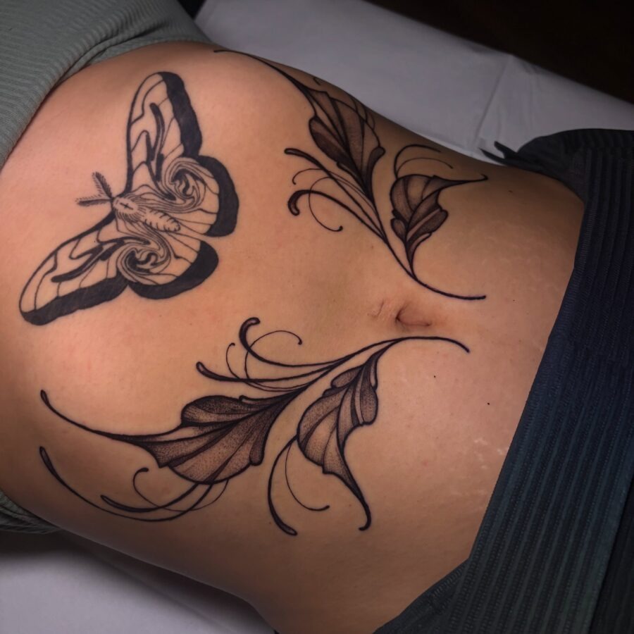 Delicate moth and leaves stomach tattoo design Tattoo Design