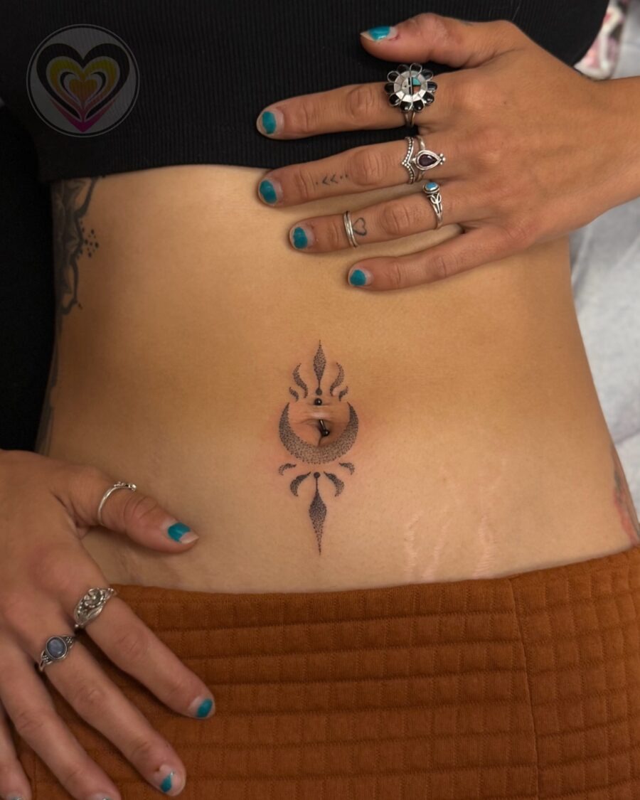 Elegant stomach tattoo design with spiritual flair Tattoo Design