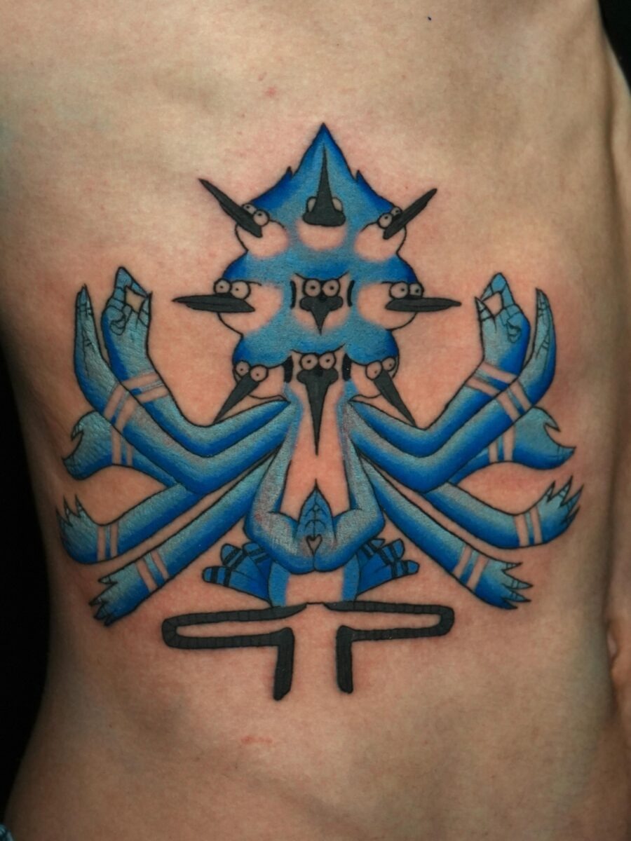 Intricate blue stomach tattoo design with symbolism Tattoo Design