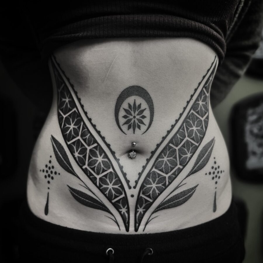 Intricate floral design on the stomach Tattoo Design