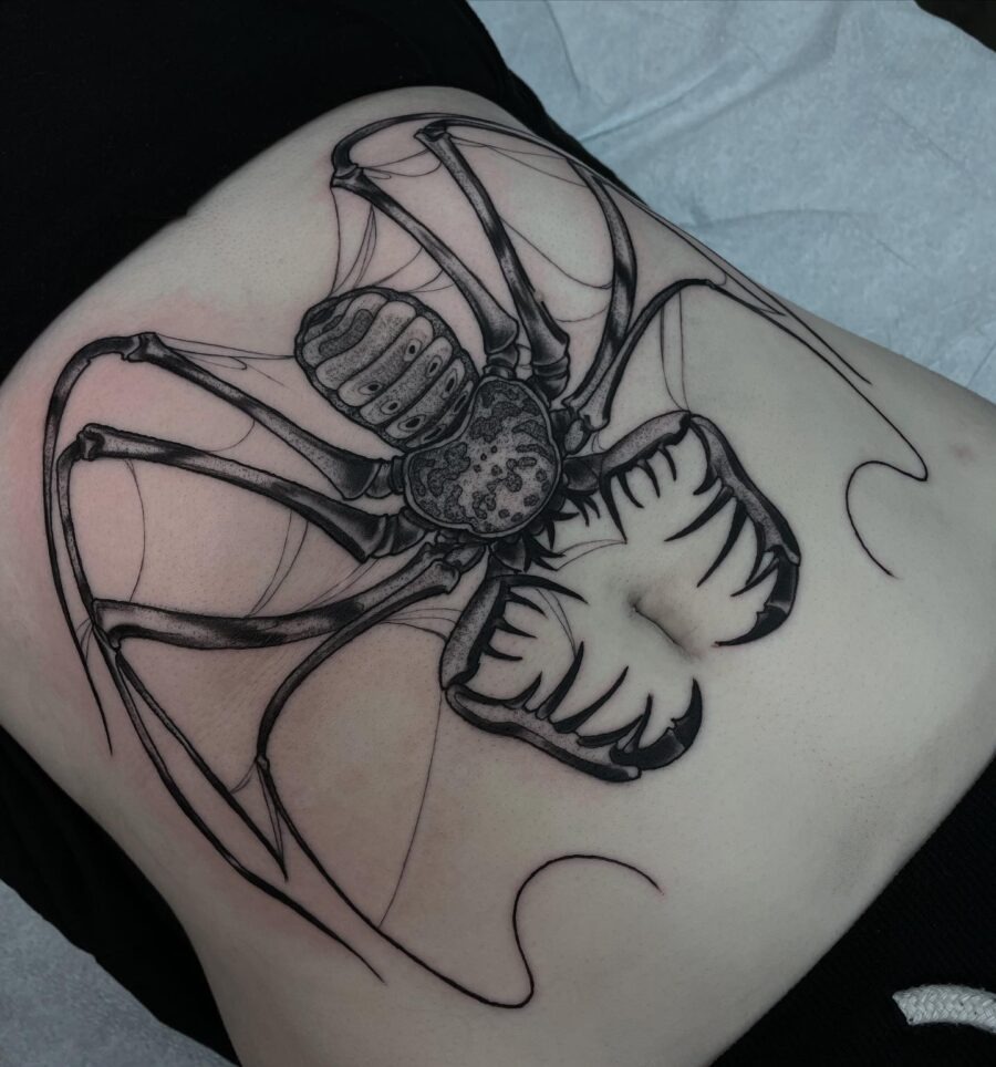 Intricate spider tattoo on the stomach Tattoo Design