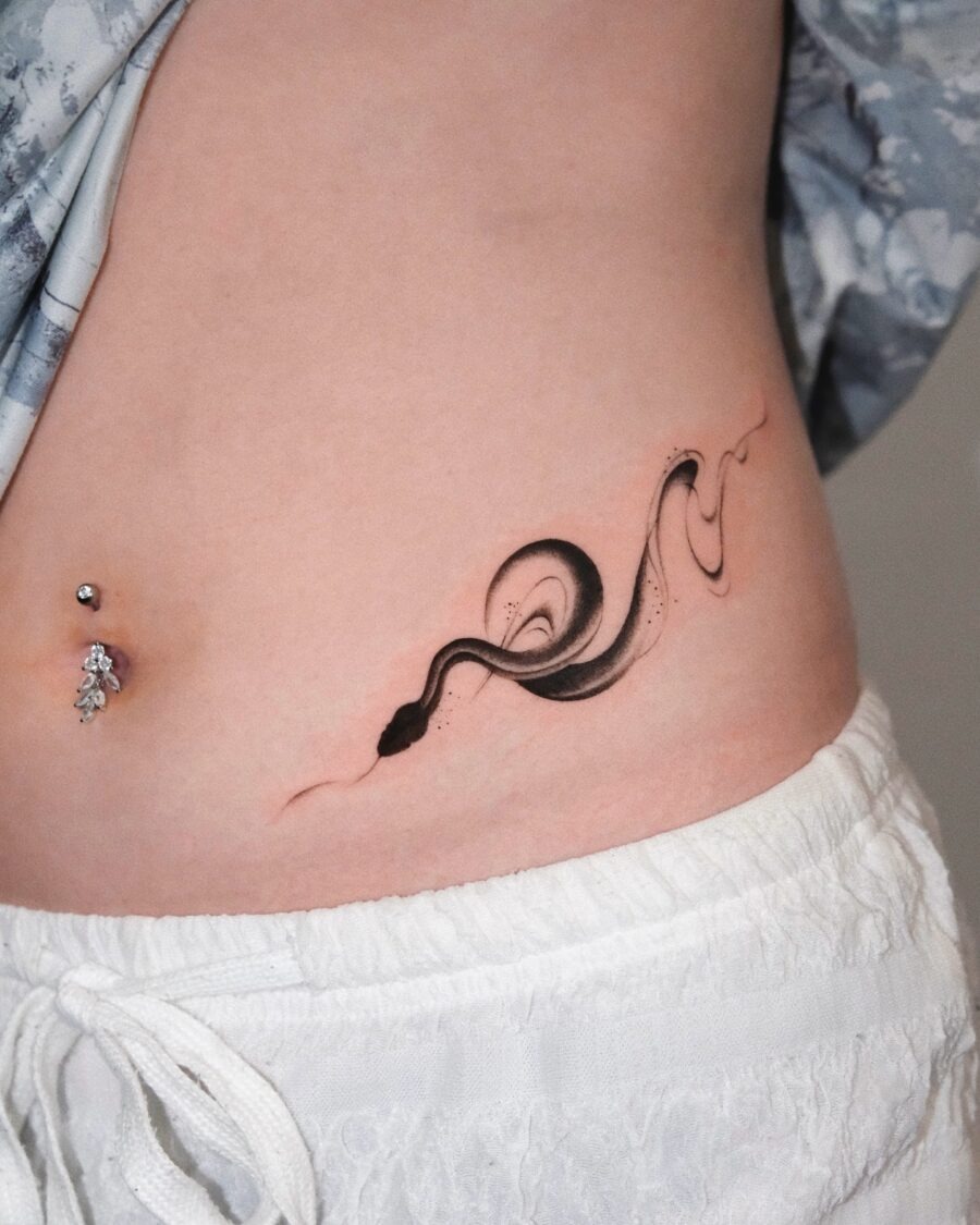 Sleek black snake tattoo flowing gracefully. Tattoo Design