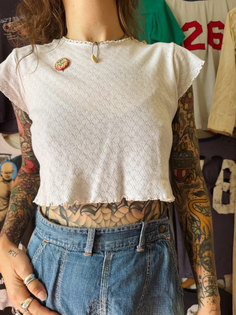 Unique stomach tattoo showcasing artistry and fashion Tattoo Design