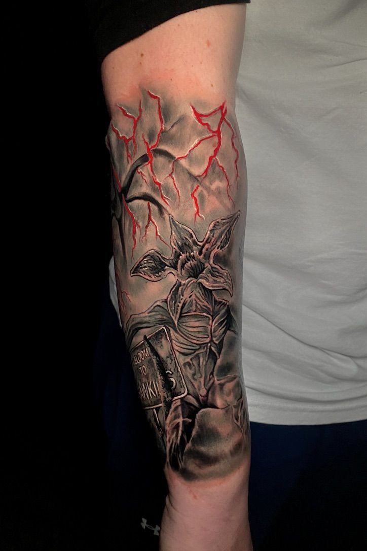 Full Sleeve Demogorgon and Storm Scene Tattoo Design